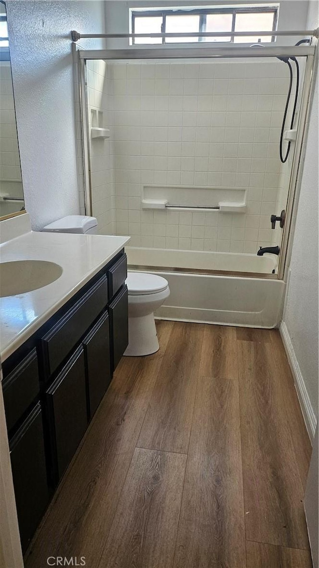 2031 Yucateca St, Perris, CA 92570 - bathroom featuring vanity, wood finished floors, and shower / tub combination