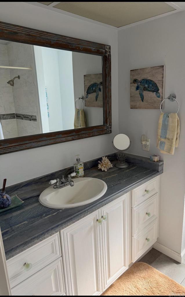 9168 Old Castle Rd, Valley Center, CA 92082 - full bath with double vanity and tiled shower