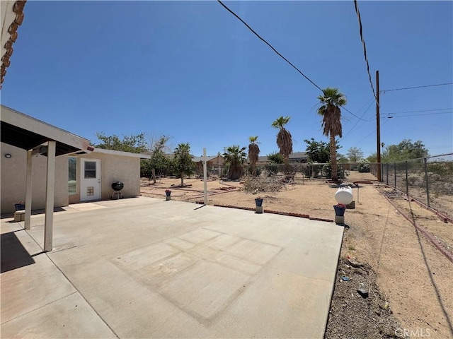 6774 Galleta Ave Unit 29, Palms, CA 92277 - fenced backyard featuring a patio area