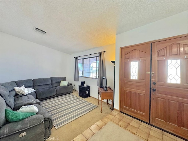 6774 Galleta Ave Unit 29, Palms, CA 92277 - entryway featuring light colored carpet and a textured ceiling