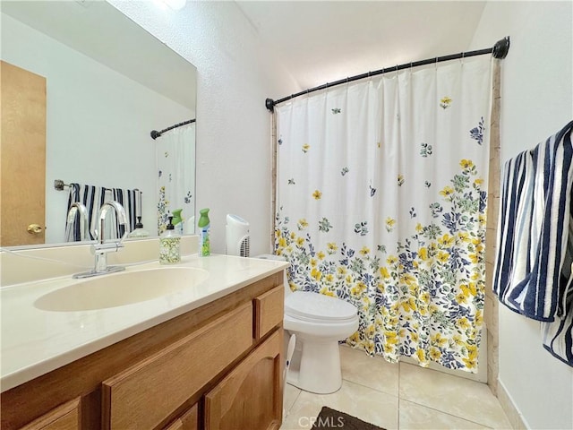 6774 Galleta Ave Unit 29, Palms, CA 92277 - bathroom featuring tile patterned flooring, vanity, and a shower with shower curtain