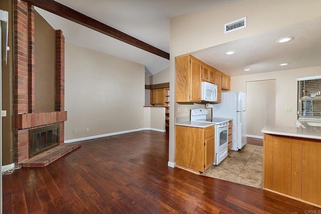 932 Alyssum Rd, Carlsbad, CA 92011 - kitchen with white appliances, wood finished floors, light countertops, a brick fireplace, and recessed lighting