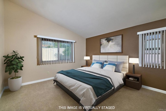 932 Alyssum Rd, Carlsbad, CA 92011 - carpeted bedroom with baseboards and lofted ceiling