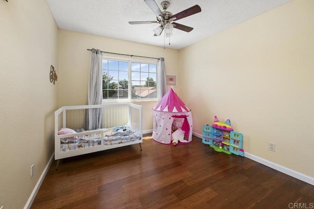 647 Boysenberry Way, Oceanside, CA 92057 - bedroom featuring wood finished floors, a textured ceiling, and a ceiling fan