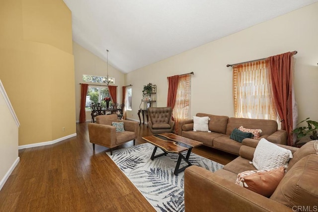 647 Boysenberry Way, Oceanside, CA 92057 - living room featuring a chandelier, wood finished floors, and high vaulted ceiling