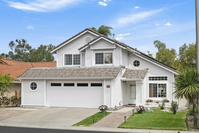 647 Boysenberry Way, Oceanside, CA 92057 - traditional home with concrete driveway, a garage, and a front yard