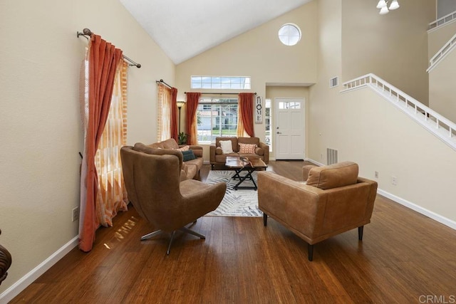 647 Boysenberry Way, Oceanside, CA 92057 - living area with high vaulted ceiling, wood finished floors, and stairway