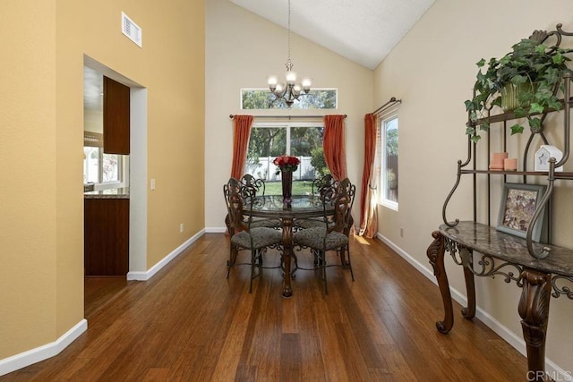647 Boysenberry Way, Oceanside, CA 92057 - dining area with a chandelier, plenty of natural light, dark wood-style flooring, and high vaulted ceiling