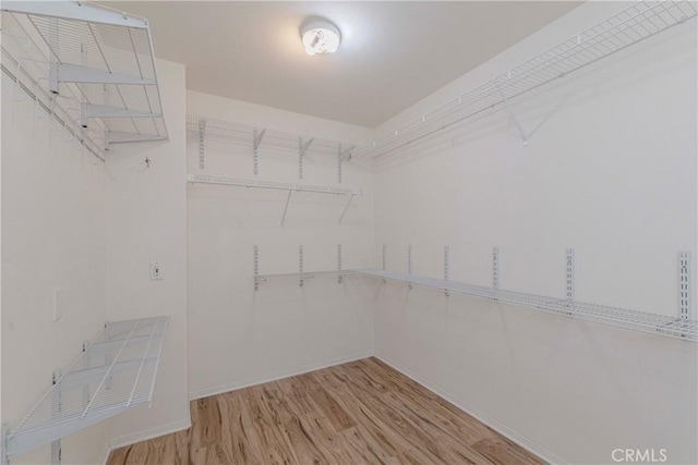 2768 Somerset Pl, Rowland Heights, CA 91748 - walk in closet featuring wood finished floors