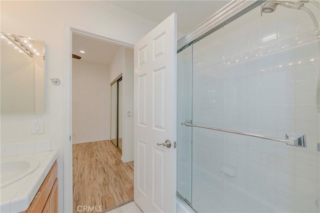 2768 Somerset Pl, Rowland Heights, CA 91748 - full bath featuring a shower with door, vanity, and wood finished floors