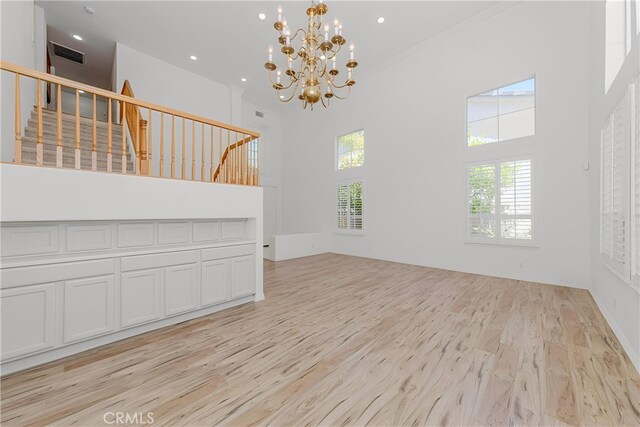 2768 Somerset Pl, Rowland Heights, CA 91748 - unfurnished living room featuring a high ceiling, light wood-style flooring, stairway, a chandelier, and recessed lighting
