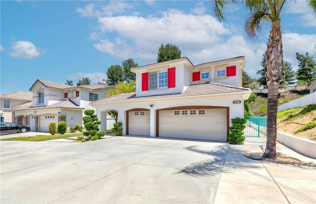 2768 Somerset Pl, Rowland Heights, CA 91748 - view of front of home with driveway, stucco siding, and a tiled roof