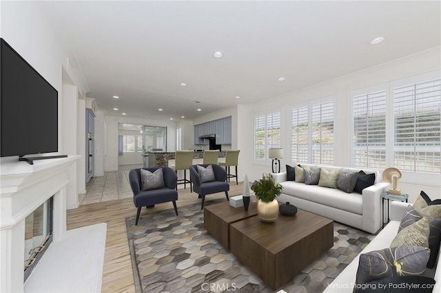 2768 Somerset Pl, Rowland Heights, CA 91748 - living room with crown molding, light wood-type flooring, and recessed lighting