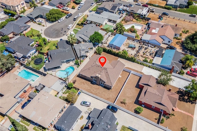 11128 Stamy Rd, Whittier, CA 90604 - aerial overview of property's location featuring nearby suburban area and a pool