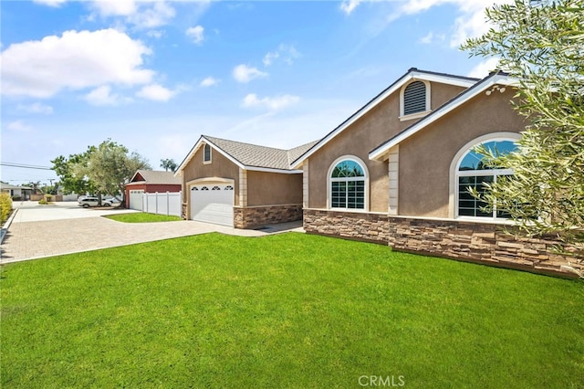 11128 Stamy Rd, Whittier, CA 90604 - ranch-style home with stucco siding, stone siding, and driveway