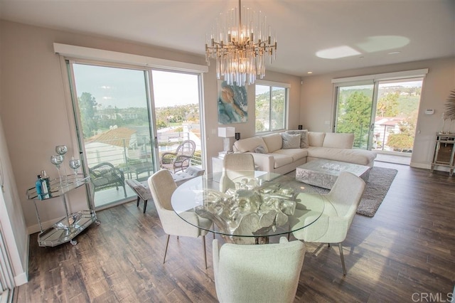 7570 Gibraltar St Unit 101, Carlsbad, CA 92009 - dining area with a chandelier and wood finished floors