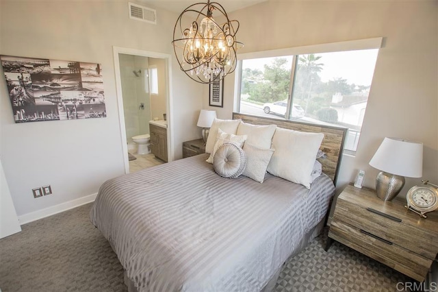 7570 Gibraltar St Unit 101, Carlsbad, CA 92009 - bedroom with a chandelier and connected bathroom