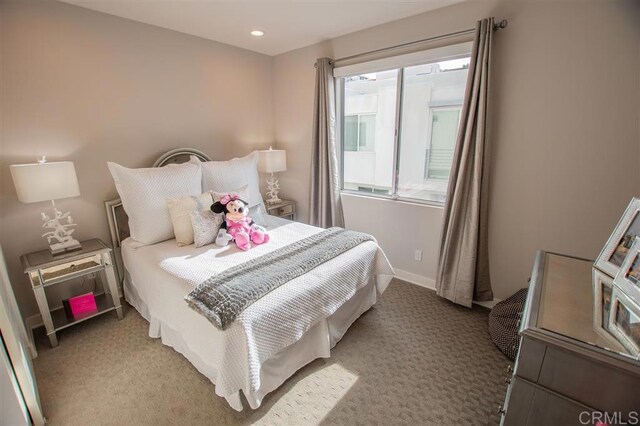 7570 Gibraltar St Unit 101, Carlsbad, CA 92009 - bedroom with light carpet and recessed lighting