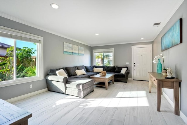 5232 Palmera Dr, Oceanside, CA 92056 - living area with ornamental molding, light wood-style floors, and recessed lighting