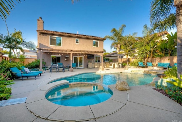 5232 Palmera Dr, Oceanside, CA 92056 - view of swimming pool with a pool with connected hot tub, a fenced backyard, a patio, and a pergola