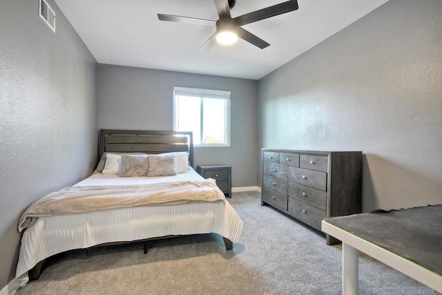 5232 Palmera Dr, Oceanside, CA 92056 - bedroom featuring a textured wall, carpet, and ceiling fan