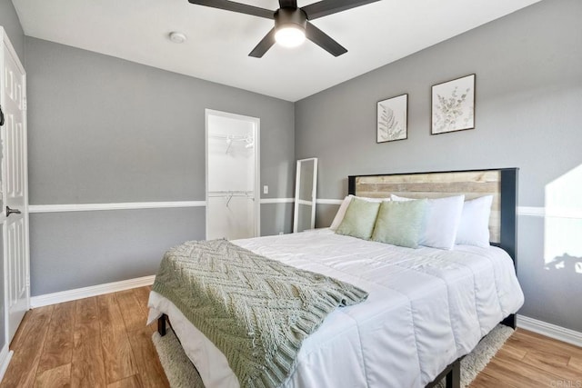 5232 Palmera Dr, Oceanside, CA 92056 - bedroom featuring wood finished floors, a closet, and ceiling fan