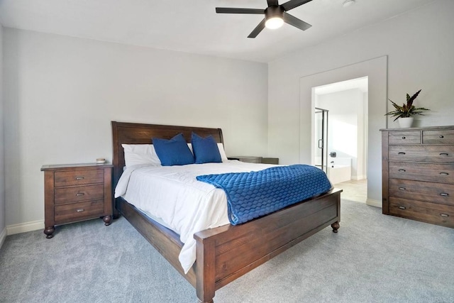 5232 Palmera Dr, Oceanside, CA 92056 - carpeted bedroom featuring ensuite bath and a ceiling fan