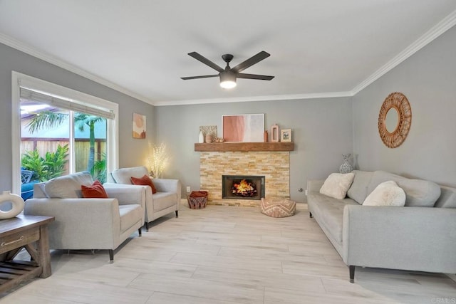 5232 Palmera Dr, Oceanside, CA 92056 - living area with crown molding, a ceiling fan, and a fireplace