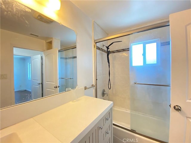 3759 Ahern Dr, Baldwin Park, CA 91706 - bathroom with vanity and bath / shower combo with glass door