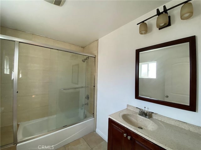 3759 Ahern Dr, Baldwin Park, CA 91706 - bathroom with vanity, tile patterned floors, and shower / bath combination with glass door