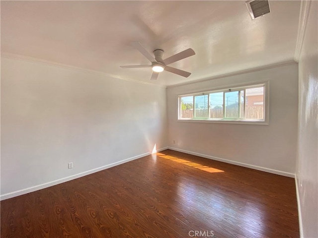 3759 Ahern Dr, Baldwin Park, CA 91706 - spare room with crown molding, a ceiling fan, and dark wood-style floors