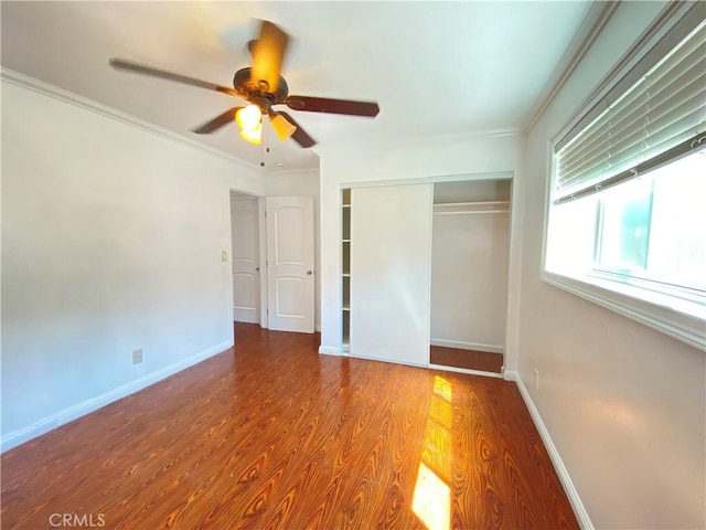 3759 Ahern Dr, Baldwin Park, CA 91706 - unfurnished bedroom featuring a closet, wood finished floors, crown molding, and ceiling fan