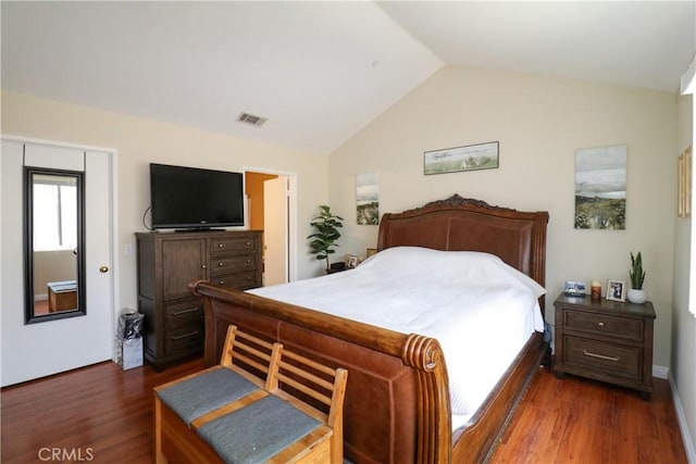 13421 Hubbard St Unit 119, Sylmar, CA 91342 - bedroom featuring vaulted ceiling and dark wood-style flooring