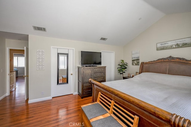 13421 Hubbard St Unit 119, Sylmar, CA 91342 - bedroom with wood finished floors and vaulted ceiling