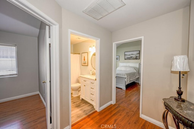 13421 Hubbard St Unit 119, Sylmar, CA 91342 - corridor featuring light wood-type flooring