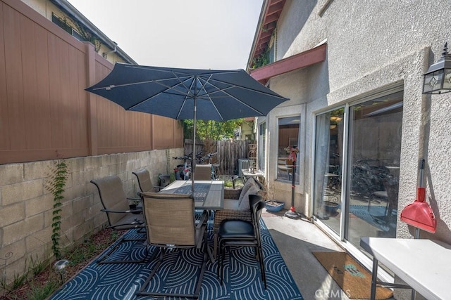 13421 Hubbard St Unit 119, Sylmar, CA 91342 - view of patio / terrace with outdoor dining area