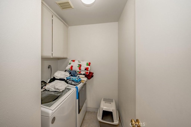 13421 Hubbard St Unit 119, Sylmar, CA 91342 - laundry area with washing machine and clothes dryer and cabinet space