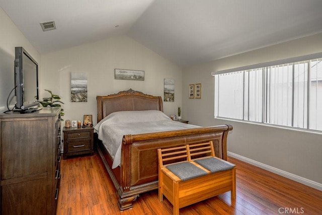 13421 Hubbard St Unit 119, Sylmar, CA 91342 - bedroom with vaulted ceiling and wood finished floors