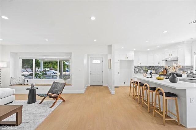 20832 Halldale Ave, Torrance, CA 90501 - living room with light wood-type flooring and recessed lighting