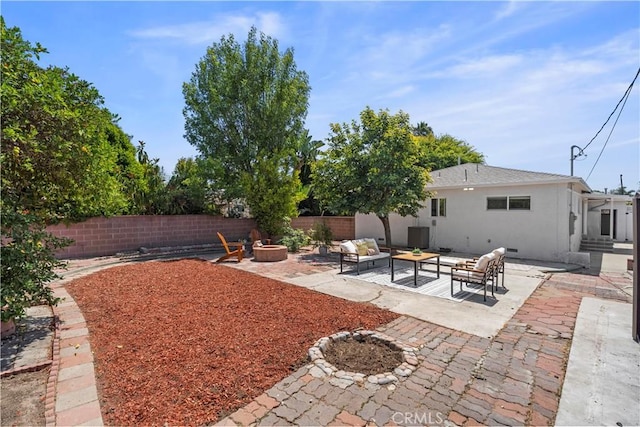 20832 Halldale Ave, Torrance, CA 90501 - fenced backyard with an outdoor living space with a fire pit and a patio