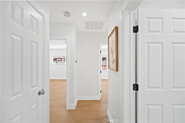20832 Halldale Ave, Torrance, CA 90501 - hallway with baseboards and light wood-type flooring