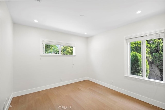 20832 Halldale Ave, Torrance, CA 90501 - empty room featuring light wood-style flooring and recessed lighting