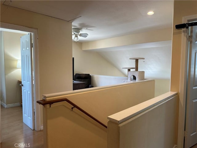 2690 Peralta Ct, Tustin, CA 92782 - corridor featuring an upstairs landing, light wood-type flooring, recessed lighting, and vaulted ceiling