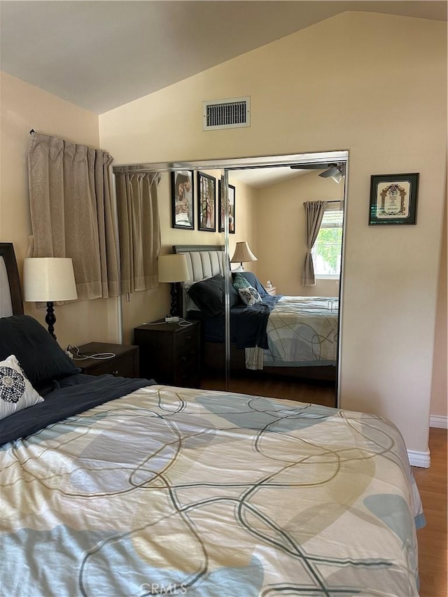 2690 Peralta Ct, Tustin, CA 92782 - bedroom featuring vaulted ceiling, wood finished floors, and a closet