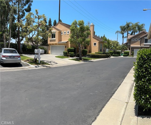 2690 Peralta Ct, Tustin, CA 92782 - view of asphalt street featuring sidewalks, street lighting, and curbs
