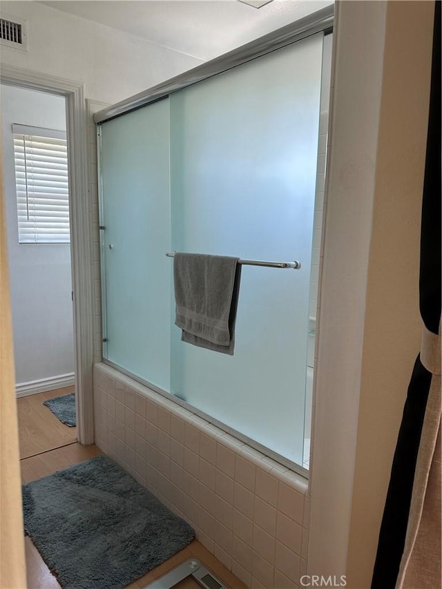 2690 Peralta Ct, Tustin, CA 92782 - full bath with a shower with shower door and wood finished floors