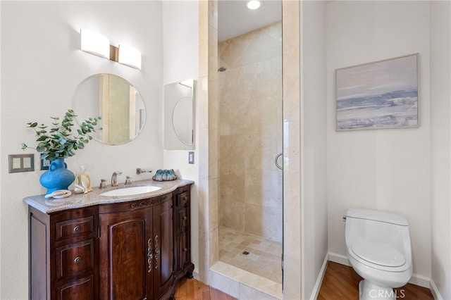 210 N Stage Coach Ln, Fallbrook, CA 92028 - bathroom featuring wood finished floors, a stall shower, and vanity