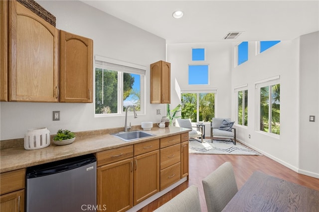 210 N Stage Coach Ln, Fallbrook, CA 92028 - kitchen featuring dishwasher, light countertops, wood finished floors, and recessed lighting