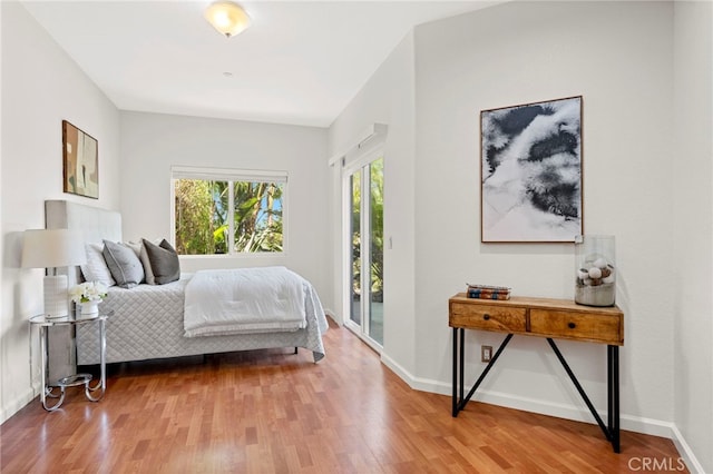 210 N Stage Coach Ln, Fallbrook, CA 92028 - bedroom featuring access to outside and wood finished floors