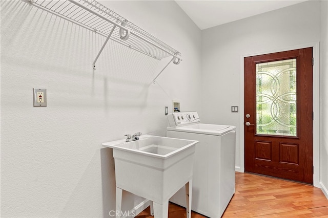 210 N Stage Coach Ln, Fallbrook, CA 92028 - laundry room with washer / clothes dryer and light wood finished floors